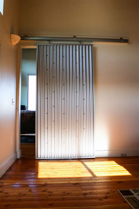 sheet metal sliding doors|residential sliding metal doors.